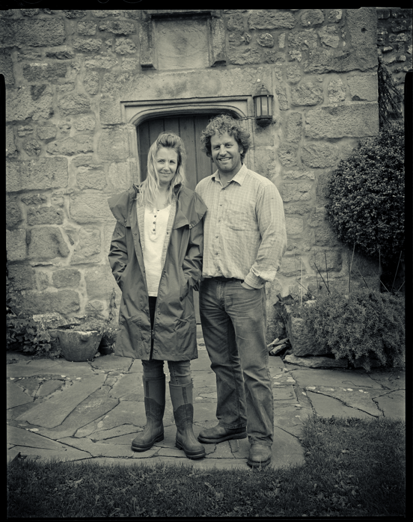 Leigh Weston and Neil Heseltine outside of their farm in Malham
