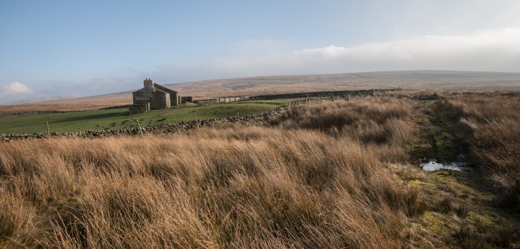 Abandoned farm house called White Green on the edge of the moors at Uldale