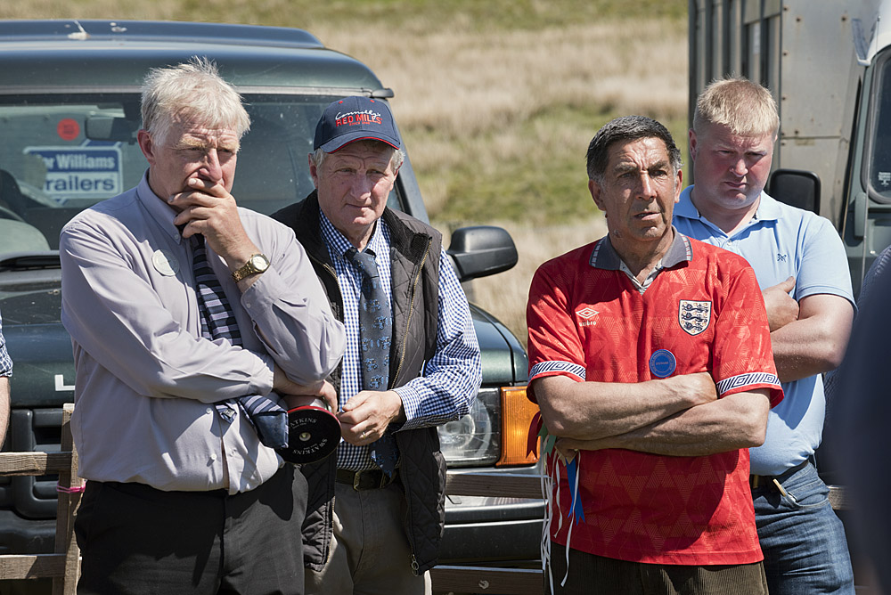 Raymond Calvert and others looking on Tan Hill