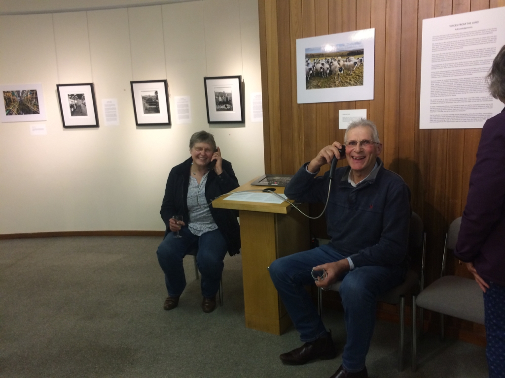 Harry and Mary Hutchinson listening to some of the recorded interviews at the Voices from the Land Exhibition, Hawes